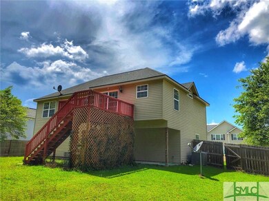View of the back, notice the covered lower patio o