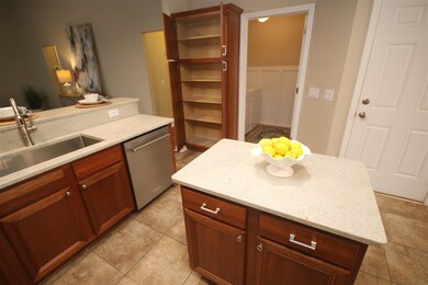pantry. Laundry room center & garage to the right.