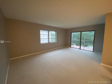 Living roon with large screened balcony