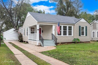 View of front of property featuring a front lawn