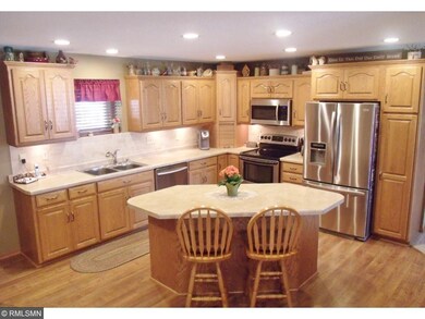 Fully updated kitchen features custom cabinetry wi