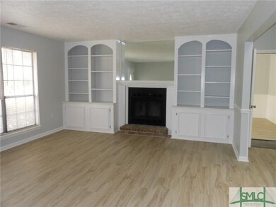 Hardwood Like Flooring in Grey Tones.  Built-In Bo