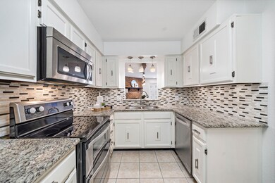 Enjoy stainless steel appliances, granite countertops, and under cabinet lighting.