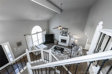 Large living room with soaring vaulted ceilings, g