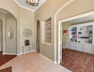 Entry with french doors to study with built ins ~