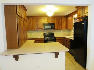Kitchen. Cherry cabinets and island