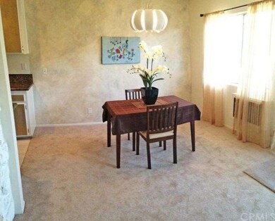 Dining room has new carpet, new lighting fixture, 