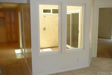 Atrium with shower, opens to both kitchen & master