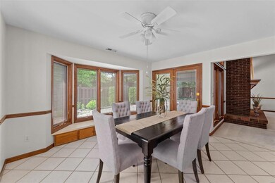 Large breakfast room has built in benches with sto