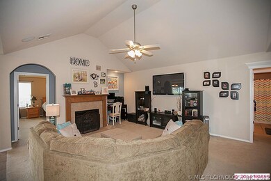 Another view of living room, showing gas fireplace