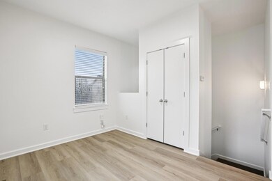 Unfurnished bedroom featuring light wood-style fl
