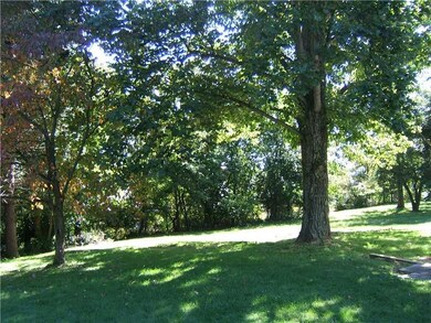 Yard/Garden. VIEW OF THE SIDE YARD. NICELY TREED F