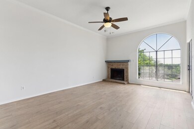 Unfurnished living room featuring light wood finis