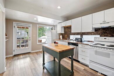 kitchen has ample storage and two refrigerators