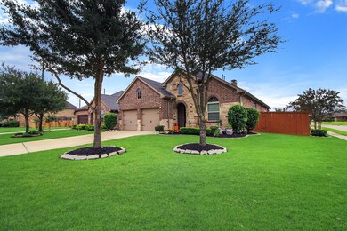Another view of this upgraded home all brick and stone exterior Home. 2 car garage with large attic space built out for storage. This home will WOW you.
