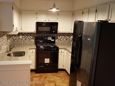 438 Indigo Ct, Morganville, NJ 07751 - photo 3