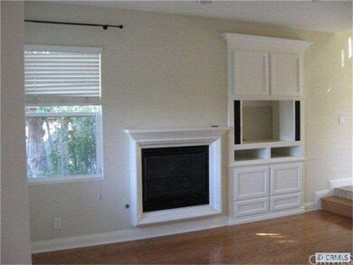 Family room with fireplace and built-in entertainm