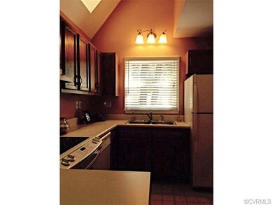 Two sky lights and the large window over sink allo