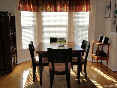 Light Filled Breakfast Room with Bay Window, Multi Member Crown Molding and Levelor 2