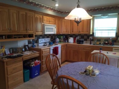 Large kitchen with built in microwave, desk, lazy 