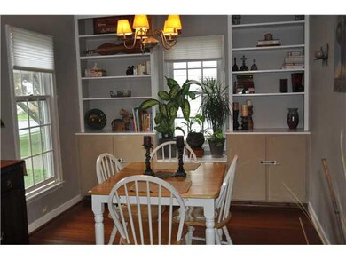 Exterior Front Formal Dining Room with built-in bo