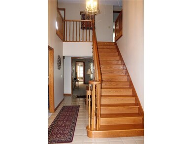 Stunning two story entry with ceramic tile and lov