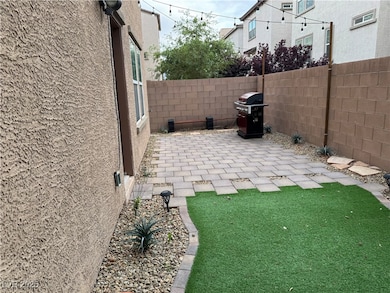 View of yard with a patio and a fenced backyard