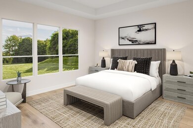 Bedroom featuring light wood-style floors and bas