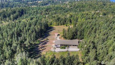 Within this 20 acres equestrian setting you will find 5 cleared acres with a thoughtful set up to host your equestrian friends! The remaining 15 wooded acres has marketable (50-year) timber - planted in 1975