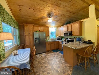 725 Running Waters Way, Great Cacapon, WV 25422 - photo 7