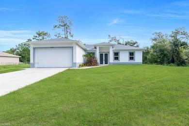 2003 E 14th St, Lehigh Acres, FL 33972 - photo 2