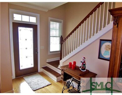 Foyer. The home has lots of windows that flood the