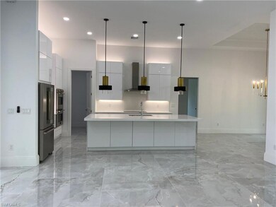 128 5th St SW, Naples, FL 34117 - photo 3