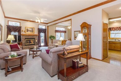 Wood burning brick fireplace in great room has hea