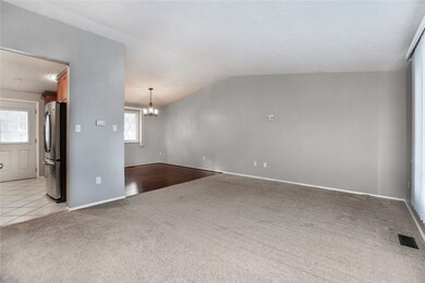 The home has been freshly painted and new carpeting is provided throughout.