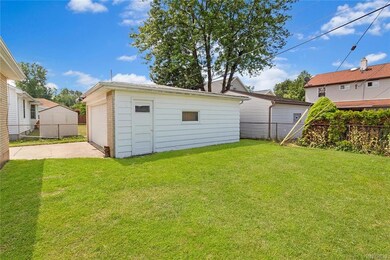 Fully fenced yard! 2 car garage with man door.