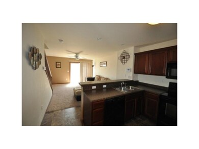 Living Room. Kitchen, Looking to living area.