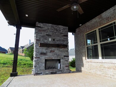 Stacked stone outdoor wood burning fireplace. Perfect for entertaining! 