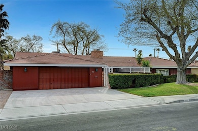 Garage with concrete driveway