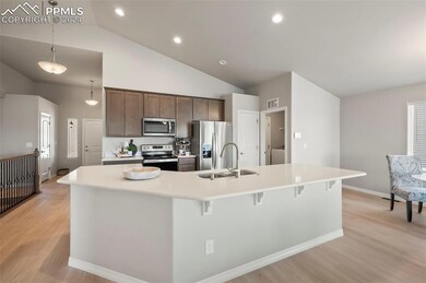 Huge kitchen and gorgeous blonde floors!