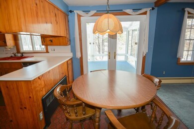 Casual eating area between kitchen...