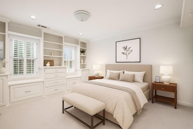 One Of Two Secondary Bedrooms With Built-In Storage & Shelving