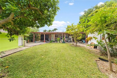 papaya, mamay , coconut enormous yard with a/c storage in green bldg.