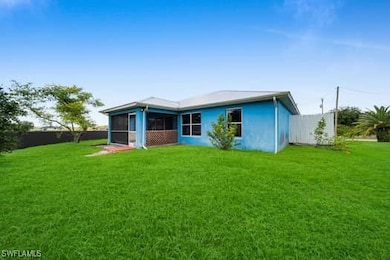 711 Downer Ave S unit 1, Lehigh Acres, FL 33974 - photo 2