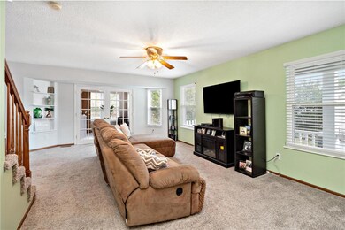 Open floor plan , lots of natural light.  Carpeted