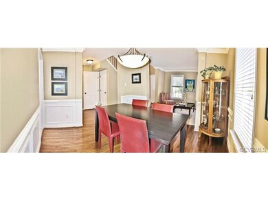 Formal dining room with new wainscoting, new chair