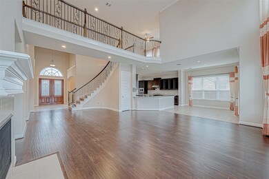 The layout highlights the room's depth and open, f