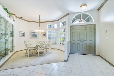 Tiled foyer entrance and dining