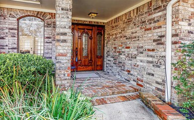 Gorgeous porch and beautiful (recently refinished) front door welcomes you home.