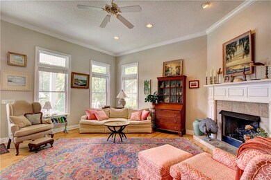 Great room with high ceilings, transom windows, ga